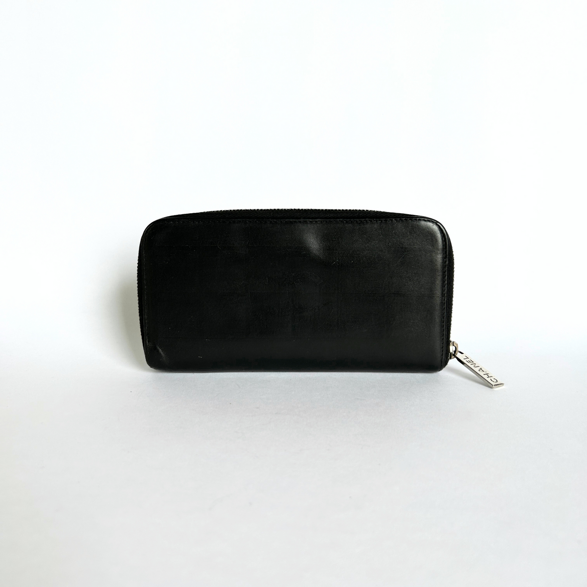 Chanel CC Zipper Wallet in Black Lambskin Leather