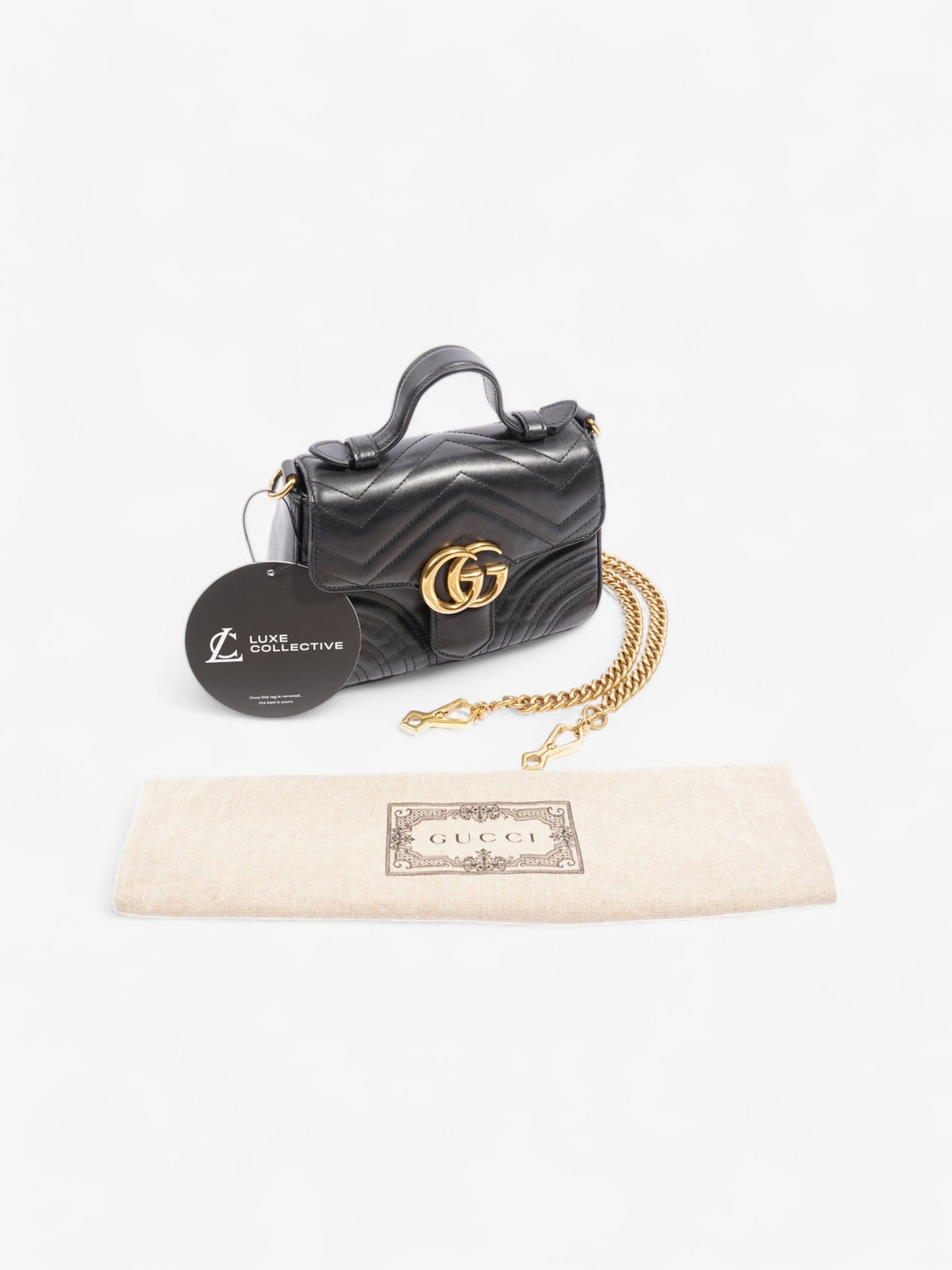 Gucci GG Marmont Mini Top Handle Bag in Quilted Black Leather Black GG Supreme Matelasse Leather Mini