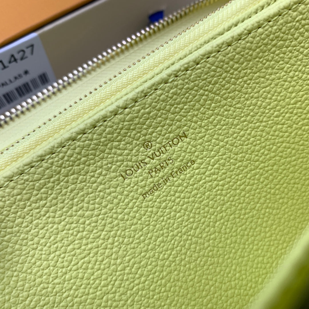 Louis Vuitton LV Unisex Zippy Wallet Yellow Monogram Empreinte Embossed Supple Grained Cowhide