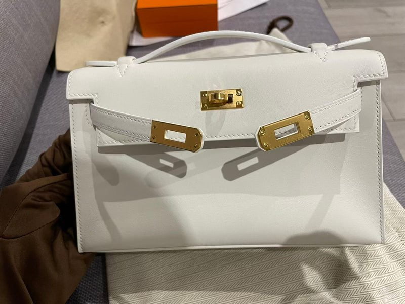 Hermes Kelly Pochette White Swift Gold Hardware