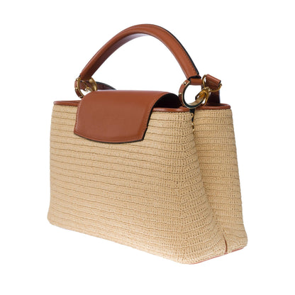 LOUIS VUITTON Limited Edition Capucines MM handbag strap in braided Raffia, GHW