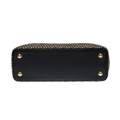 LOUIS VUITTON Limited Edition Capucines MM handbag strap in braided Raffia, GHW
