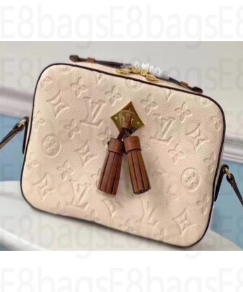 Louis Vuitton Saintonge Monogram Empreinte Leather Creme Caramel