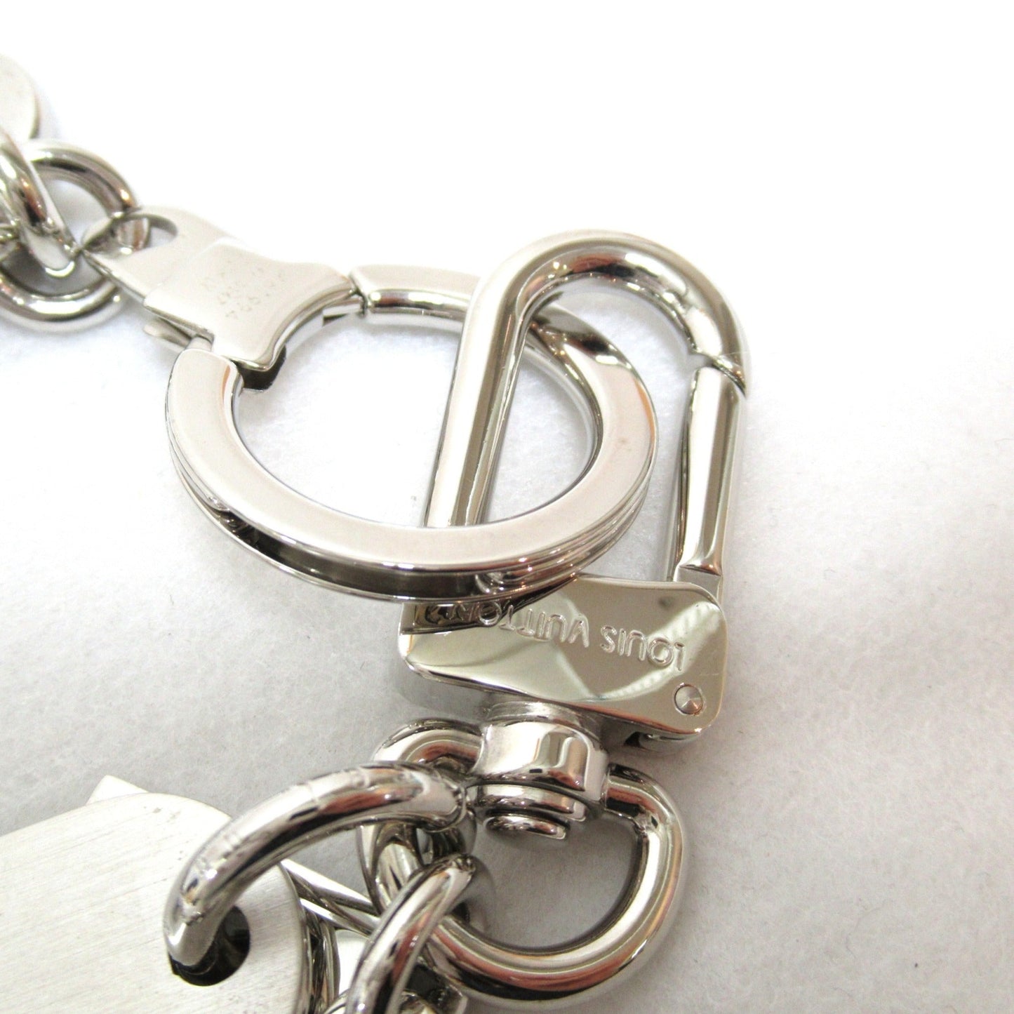 LOUIS VUITTON Portocle Chenne V Square Keychain Silver Stainless Steel M61994
