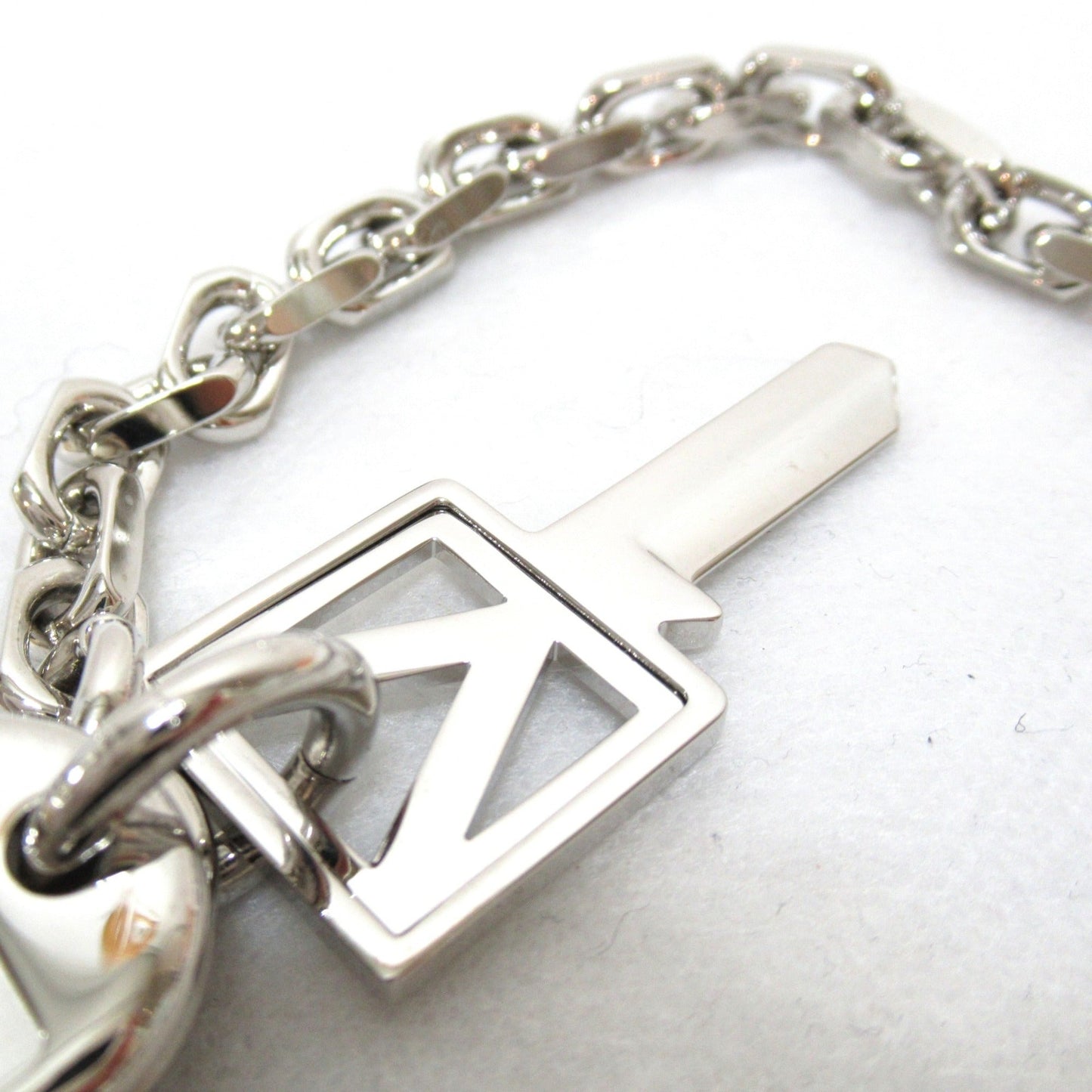 LOUIS VUITTON Portocle Chenne V Square Keychain Silver Stainless Steel M61994