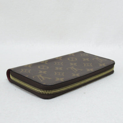 LOUIS VUITTON Zippy wallet purse Brown Pink Fuschia Monogram PVC coated canvas M41895