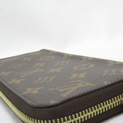 LOUIS VUITTON Zippy wallet purse Brown Pink Fuschia Monogram PVC coated canvas M41895
