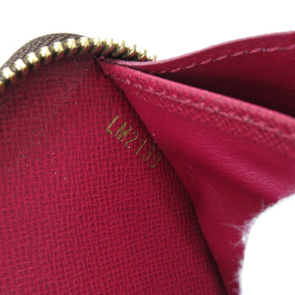 LOUIS VUITTON Zippy wallet purse Brown Pink Fuschia Monogram PVC coated canvas M41895