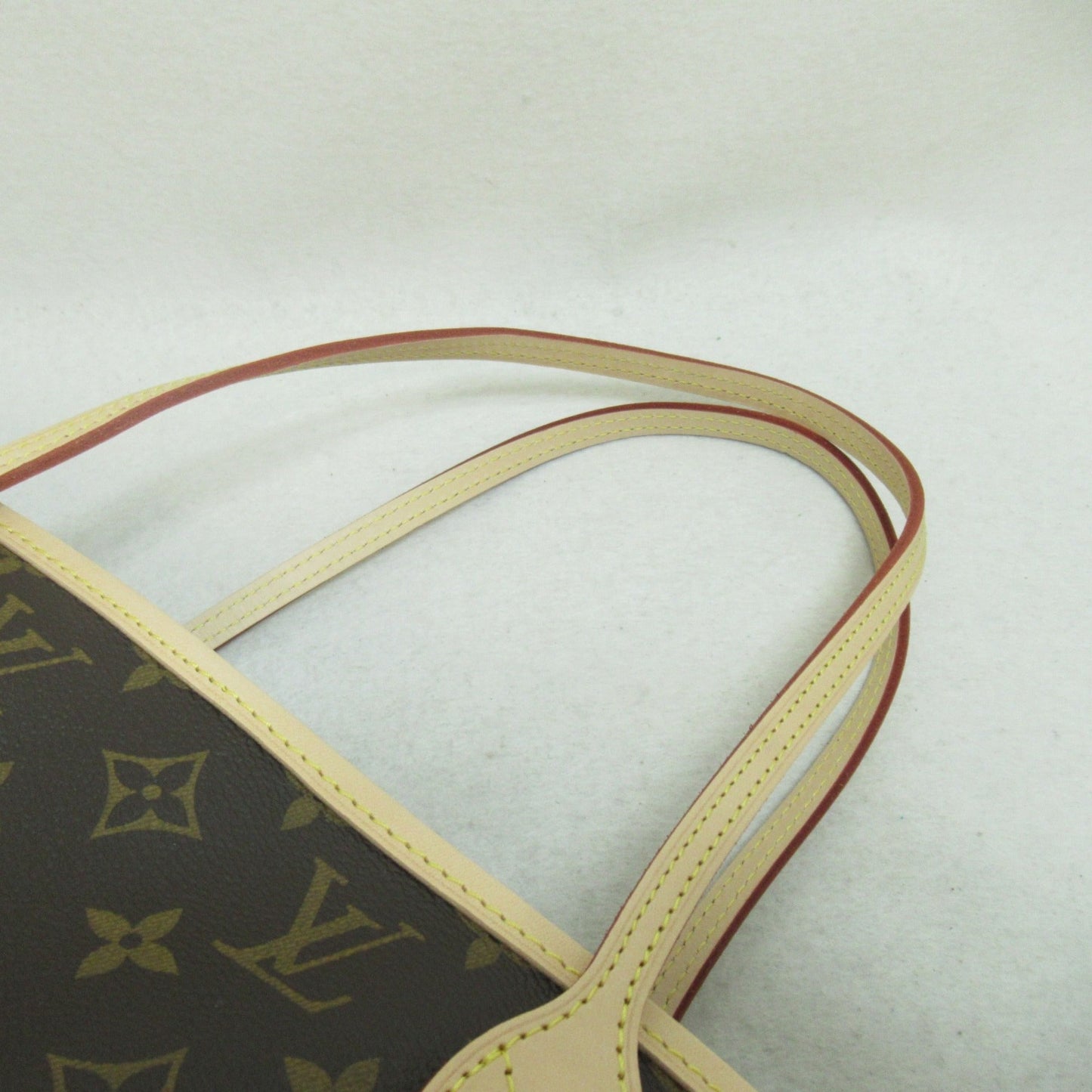 LOUIS VUITTON Never full PM Brown Pivoine Fuschia Monogram PVC coated canvas M41245