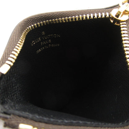 LOUIS VUITTON Pochette trio Brown Monogram / Giant Reverse PVC coated canvas M68756