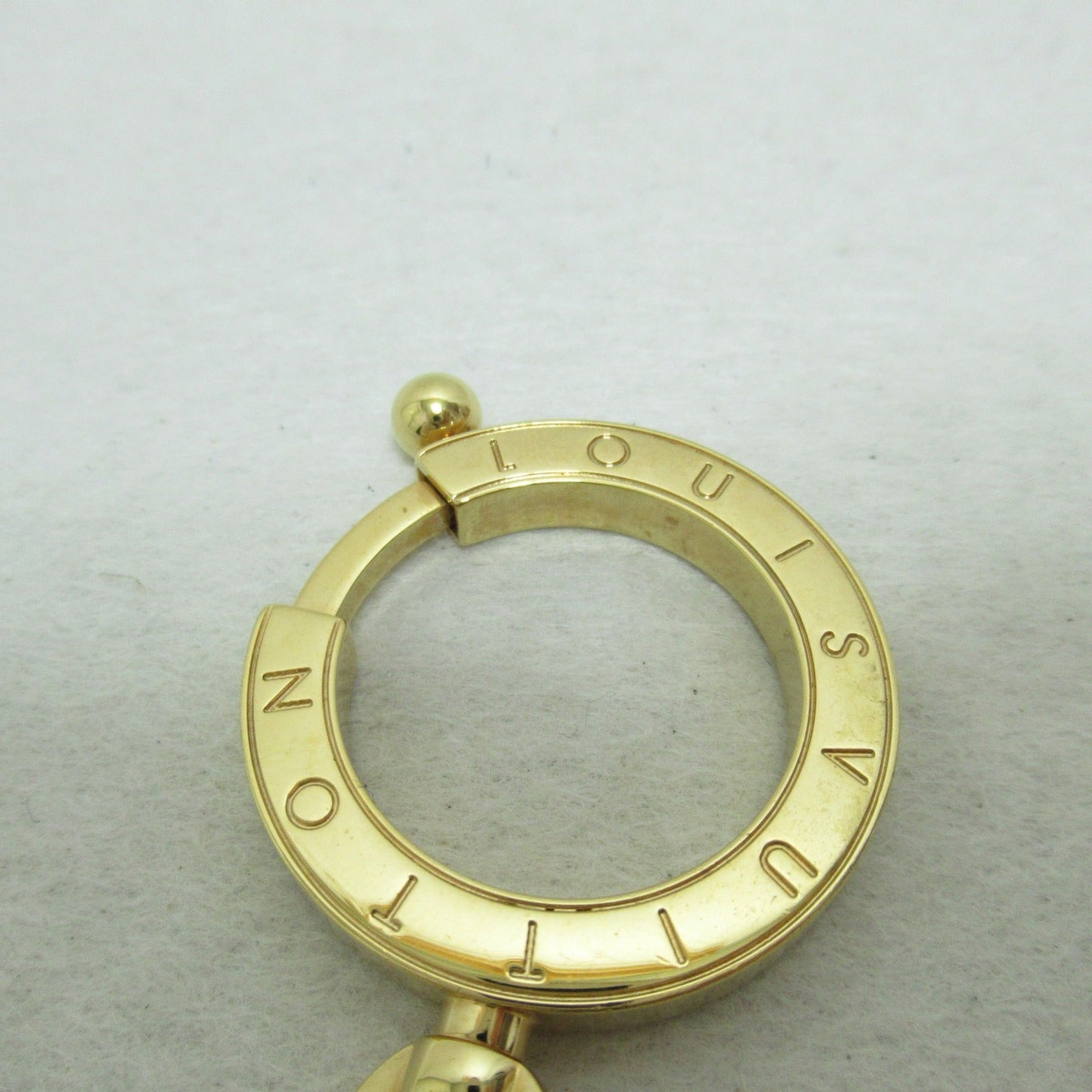 LOUIS VUITTON Porto Cres Swing Key Holder Gold Gold Plated M65997