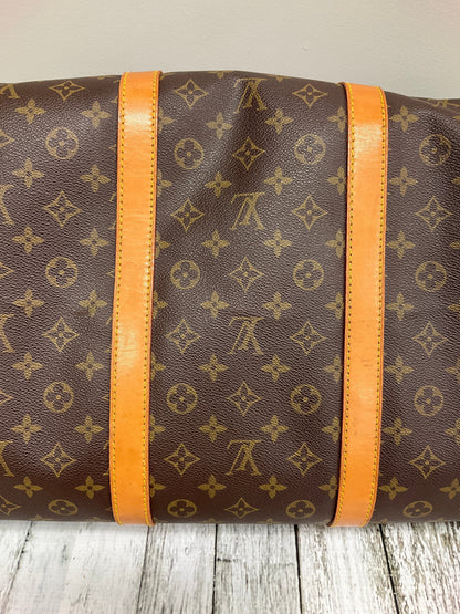 Duffle And Weekender Designer By Louis Vuitton  Size: Large
