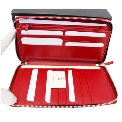 GUCCI Signature Continental Guccissima Zip-around Wallet