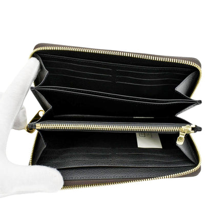 LOUIS VUITTON Giant Monogram Reverse Zippy Wallet Brown
