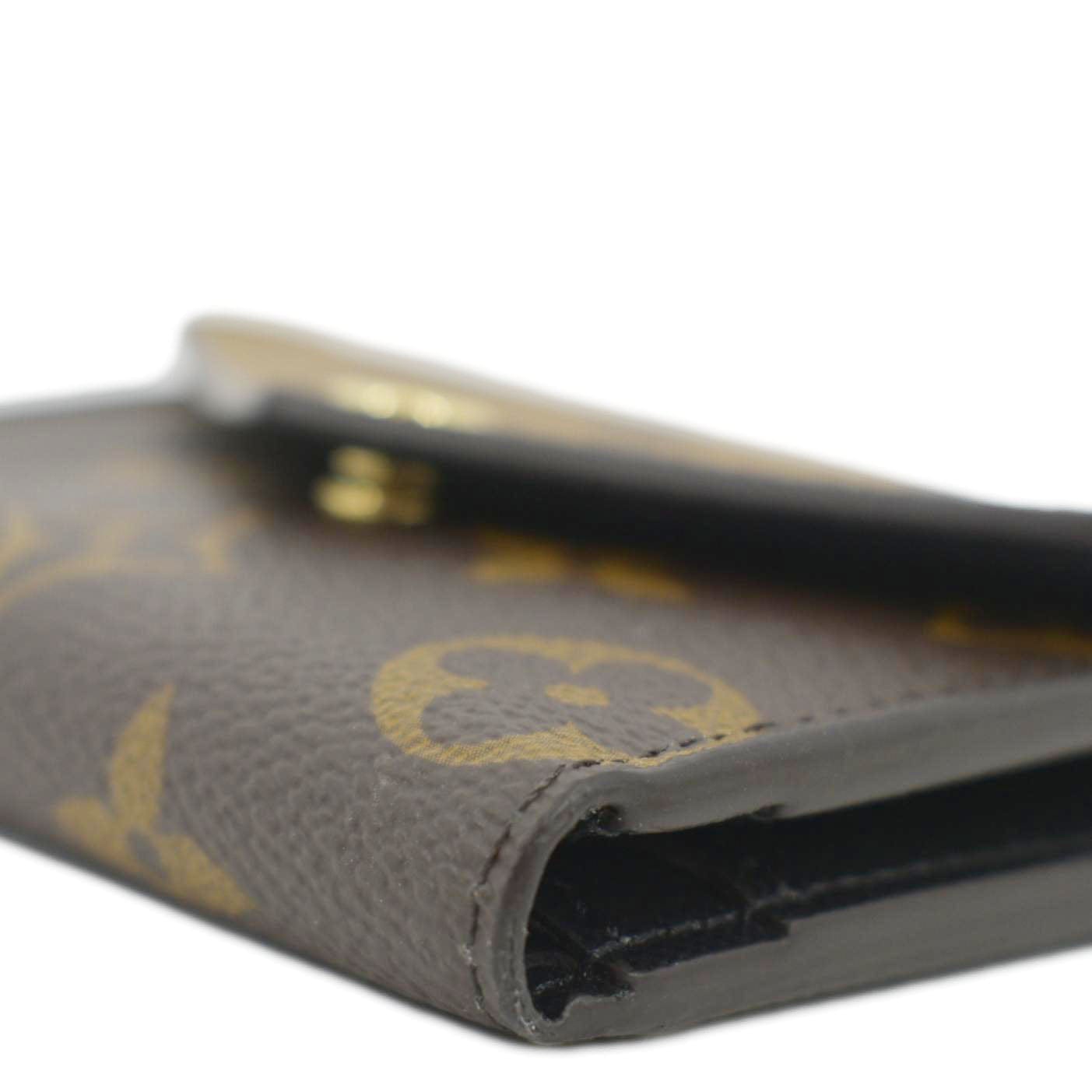 LOUIS VUITTON Zoe Monogram Reverse Canvas Wallet Brown