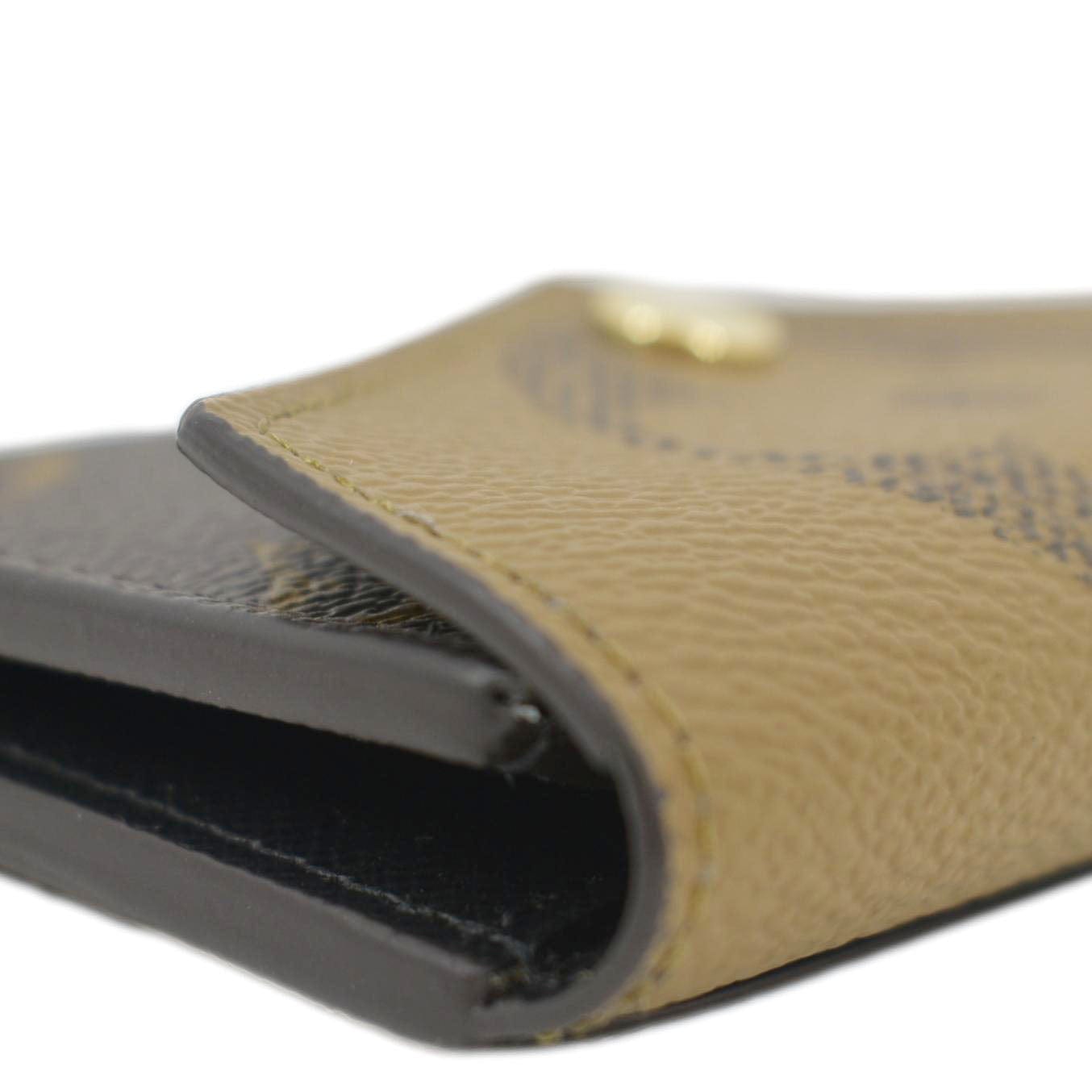 LOUIS VUITTON Zoe Monogram Reverse Canvas Wallet Brown