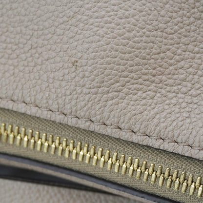 LOUIS VUITTON Maida Monogram Empreinte Leather Hobo Shoulder Bag Dune