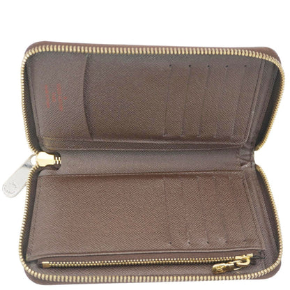LOUIS VUITTON Zip Around Damier Ebene Wallet Brown
