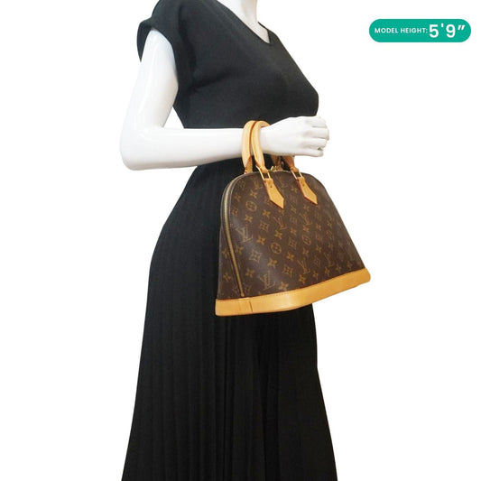 LOUIS VUITTON Alma Monogram Canvas Satchel Bag Brown