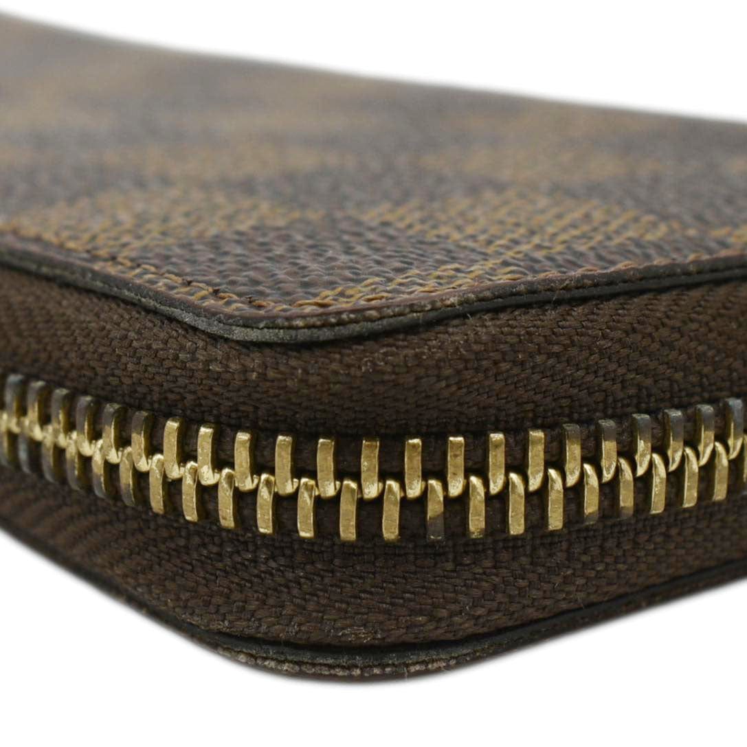 LOUIS VUITTON Clemence Damier Ebene Zippy Wallet Brown
