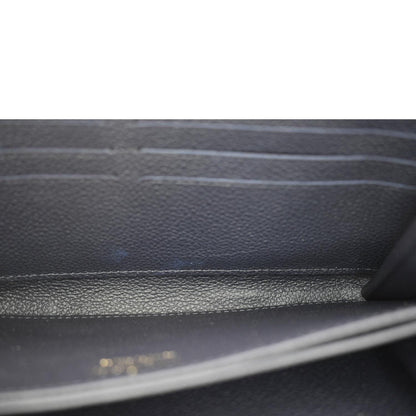 LOUIS VUITTON Clemence Monogram Empreinte Leather Wallet Navy Blue