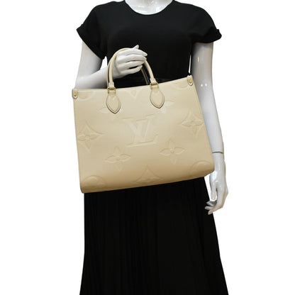 LOUIS VUITTON Onthego MM Monogram Empreinte Leather Tote Bag Cream
