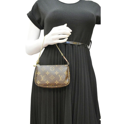 LOUIS VUITTON  Mini Pochette Monogram Canvas Accessoires Pouch Brown