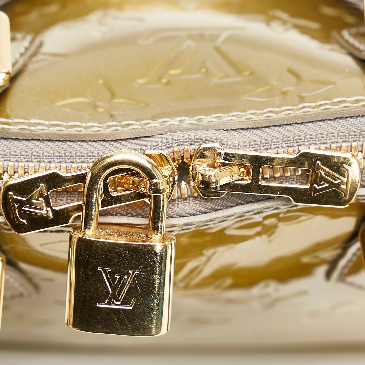 LOUIS VUITTON Monogram Vernis Alma BB Gold