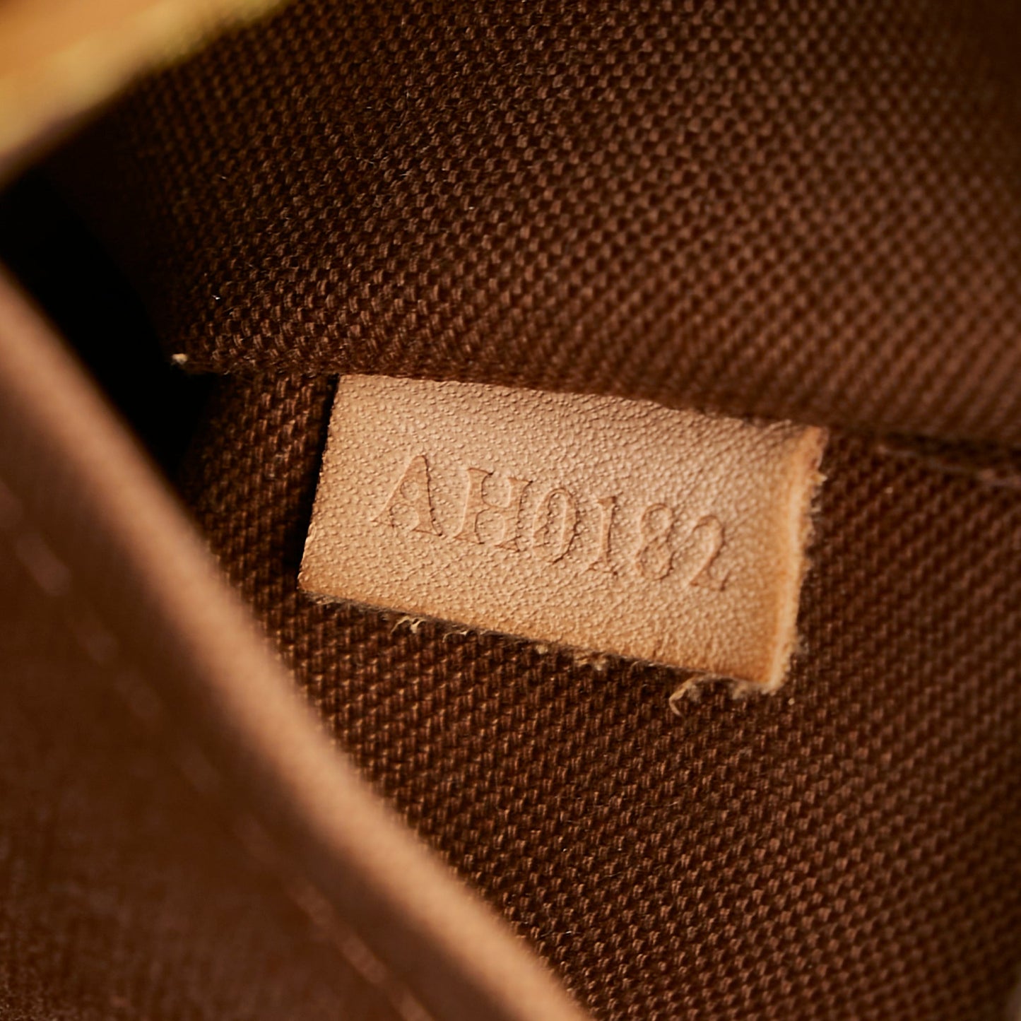 LOUIS VUITTON Monogram Tivoli PM Brown