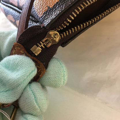 LOUIS VUITTON X Stephen Sprouse Limited Edition Graffiti Pochette Accessorie bag in brown canvas