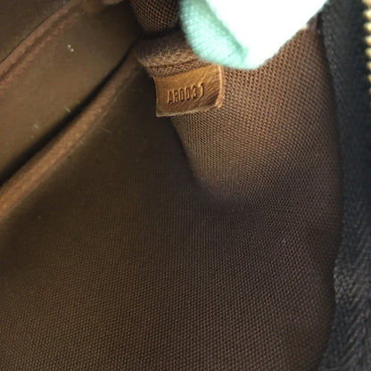 LOUIS VUITTON X Stephen Sprouse Limited Edition Graffiti Pochette Accessorie bag in brown canvas