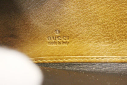 GUCCI GG Canvas Zip Around with Tassels Wallet 261393