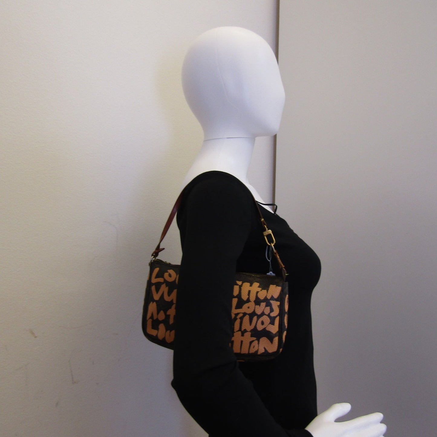 LOUIS VUITTON X Stephen Sprouse Limited Edition Graffiti Pochette Accessorie bag in brown canvas