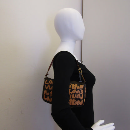 LOUIS VUITTON X Stephen Sprouse Limited Edition Graffiti Pochette Accessorie bag in brown canvas