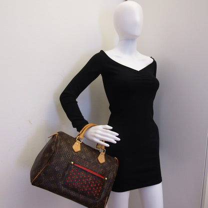 LOUIS VUITTON Limited Edition Orange Monogram Perforated Speedy 30 Handbag