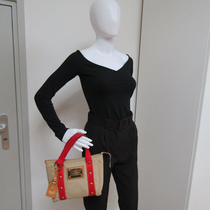LOUIS VUITTON Handbag in Beige Fabric