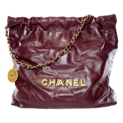 Chanel Small Leather Gold Clutch