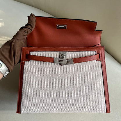 Pre-owned Certified Hermes Kelly 25 Toile Cuivre with Silver Hardware, 2022, Full Set