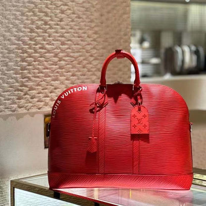 Louis Vuitton LV Unisex Alma Travel GM Vermillon Red Epi XL Grained Leather Handle Clip
