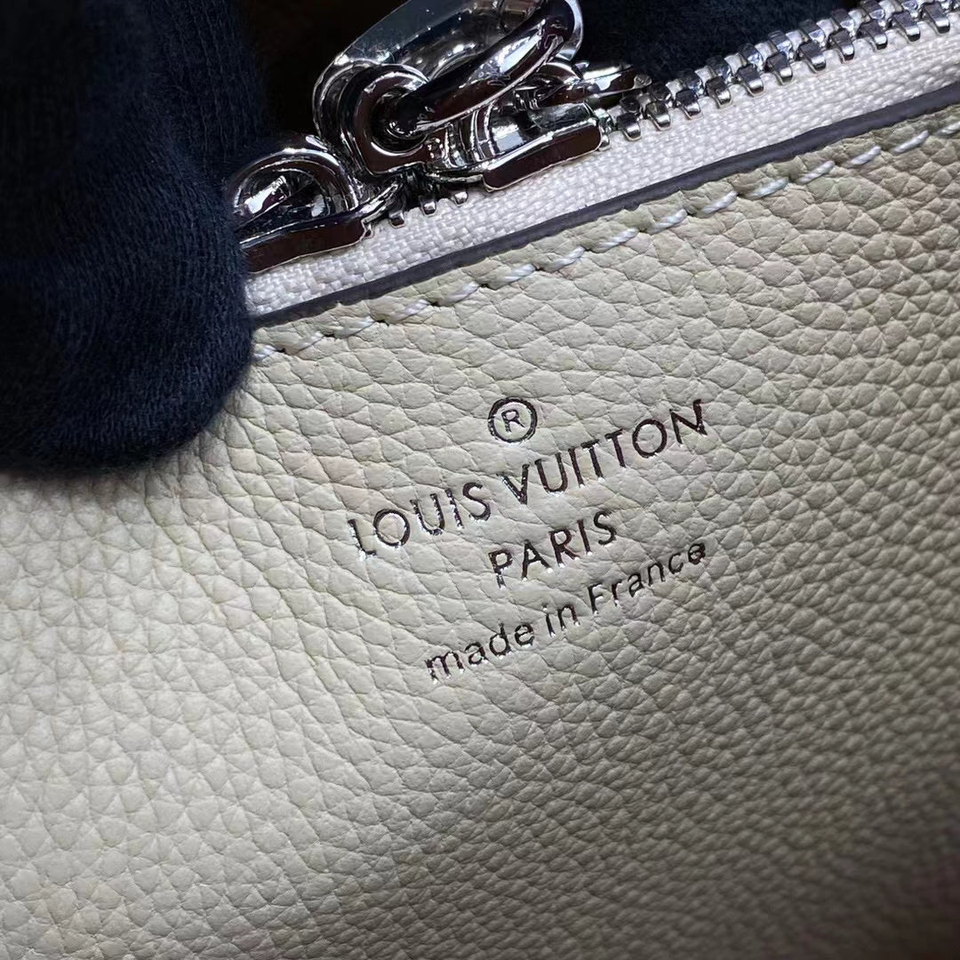 Louis Vuitton LV Women Muria Bucket Bag Crème Beige Mahina Perforated Calf Leather