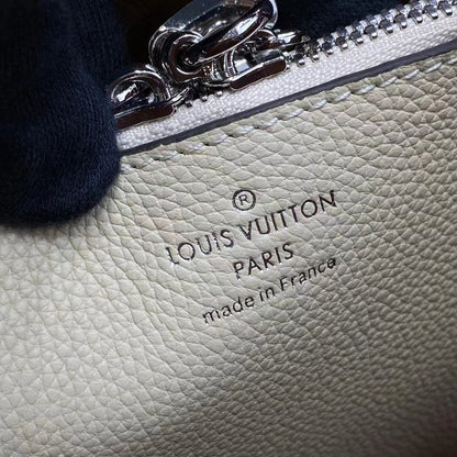 Louis Vuitton LV Women Muria Bucket Bag Crème Beige Mahina Perforated Calf Leather