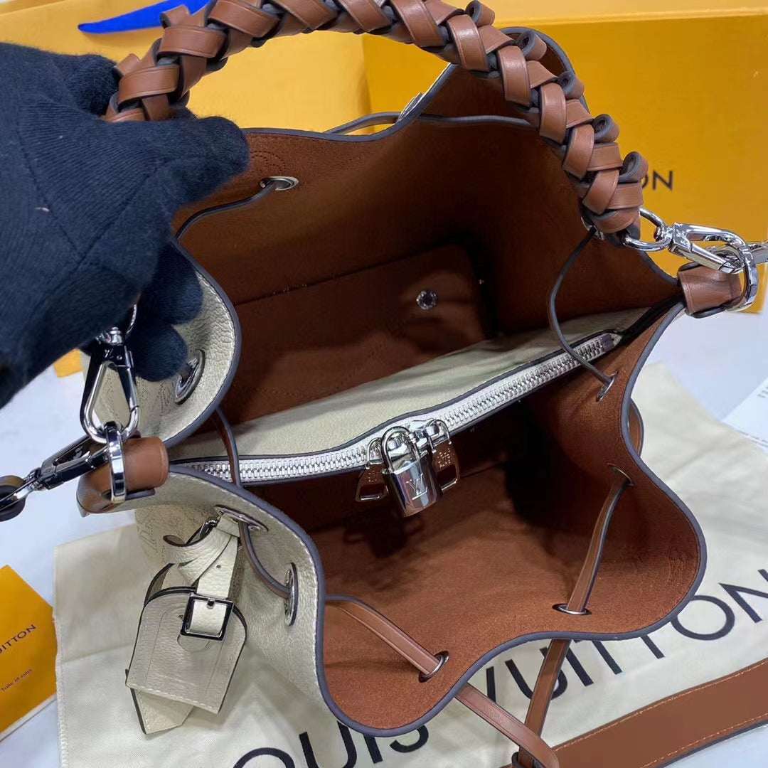 Louis Vuitton LV Women Muria Bucket Bag Crème Beige Mahina Perforated Calf Leather