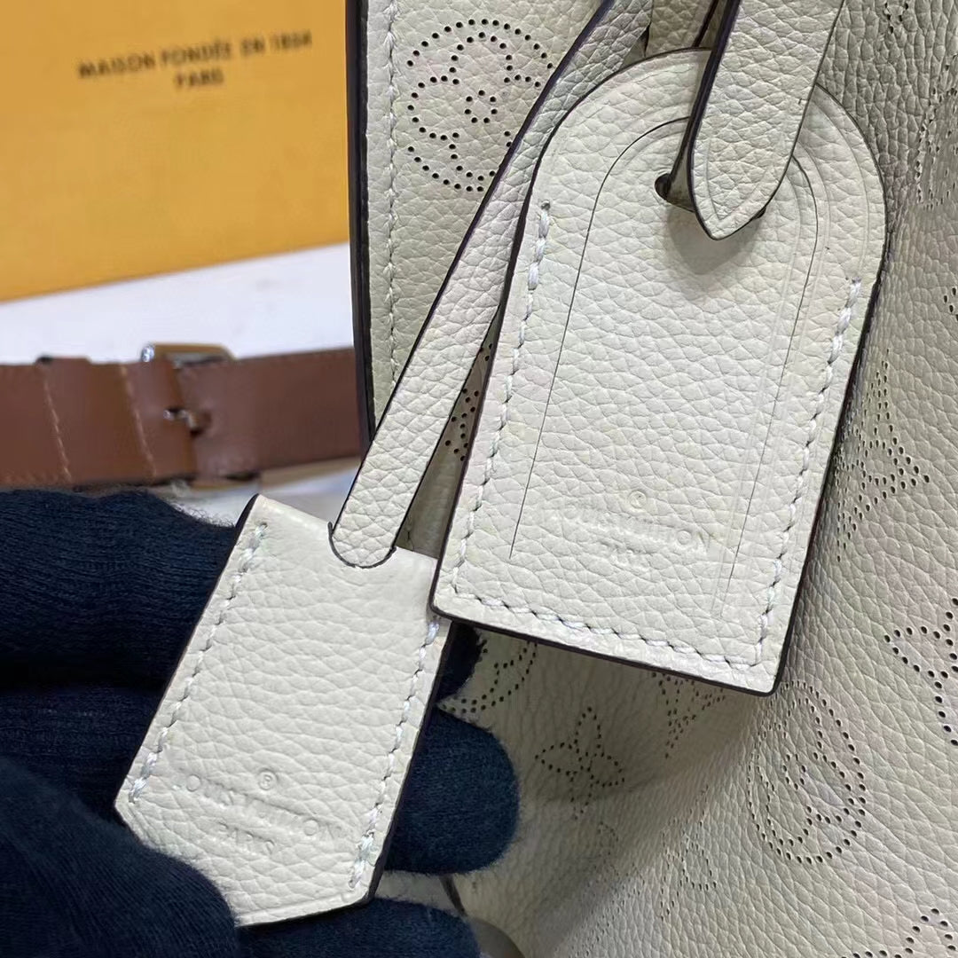 Louis Vuitton LV Women Muria Bucket Bag Crème Beige Mahina Perforated Calf Leather