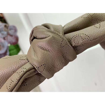 Louis Vuitton LV Unisex Why Knot MM Handbag Galet Beige Perforated Mahina Calf Leather