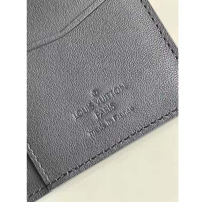 Louis Vuitton LV Unisex Zippy Coin Purse Vertical Taiga Grained Calf Leather