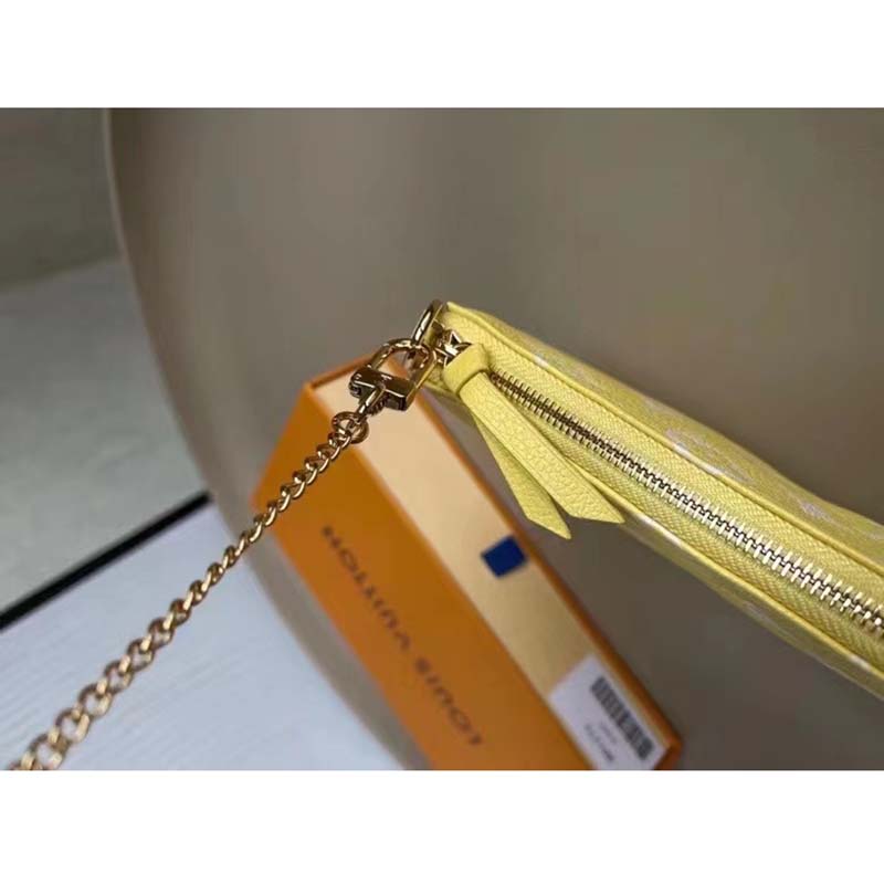 Louis Vuitton LV Women Mini Pochette Accessoires Yellow Monogram Empreinte Embossed Supple Grained Cowhide
