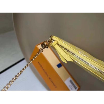 Louis Vuitton LV Women Mini Pochette Accessoires Yellow Monogram Empreinte Embossed Supple Grained Cowhide