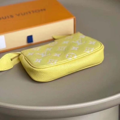 Louis Vuitton LV Women Mini Pochette Accessoires Yellow Monogram Empreinte Embossed Supple Grained Cowhide