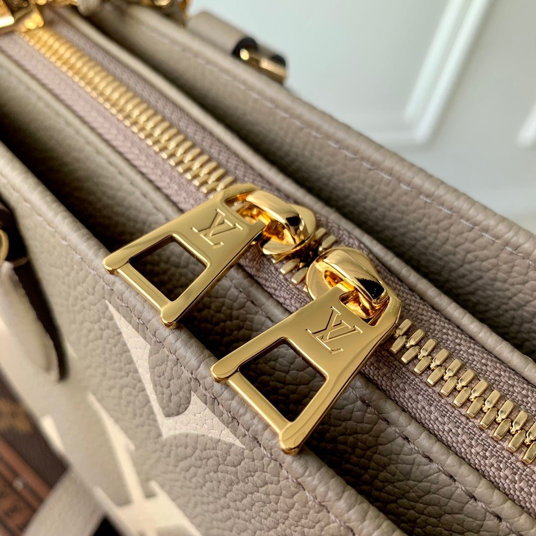 Louis Vuitton LV Women OnTheGo East West Dove Cream Embossed Grained Cowhide Leather
