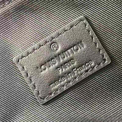 Louis Vuitton Men City Keepall in Black Monogram Seal Leather
